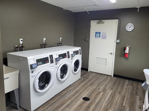 A laundry room with a washer and dryer.